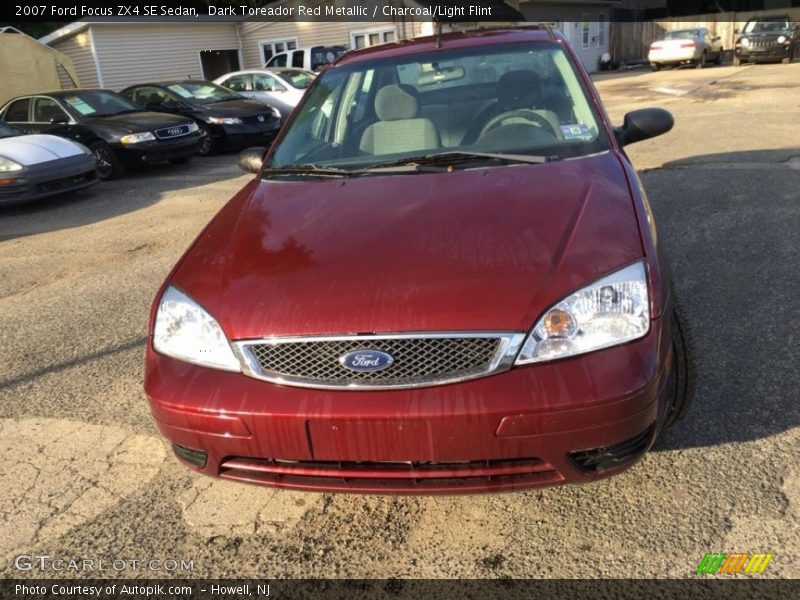 Dark Toreador Red Metallic / Charcoal/Light Flint 2007 Ford Focus ZX4 SE Sedan