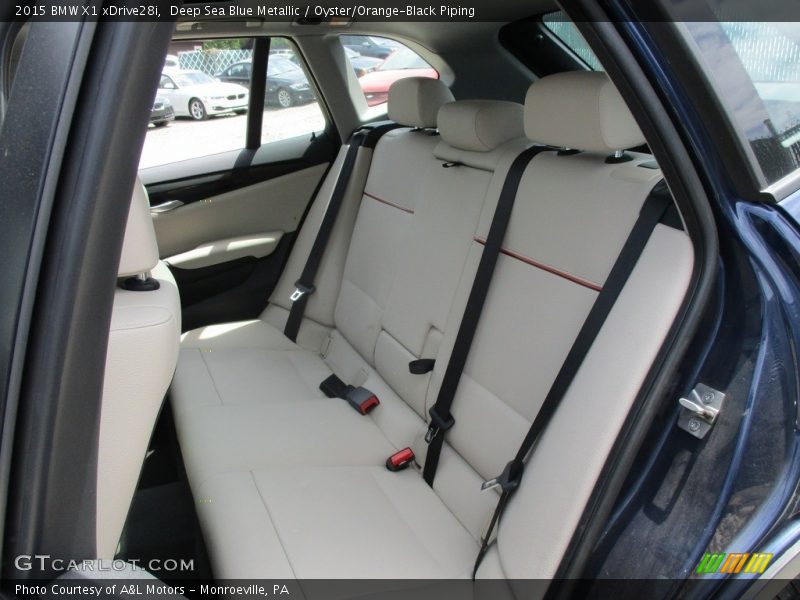Deep Sea Blue Metallic / Oyster/Orange-Black Piping 2015 BMW X1 xDrive28i