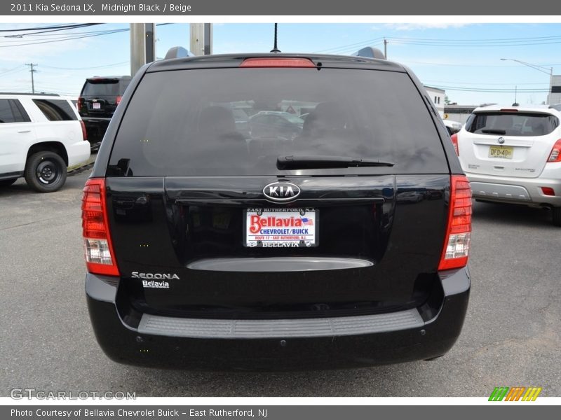 Midnight Black / Beige 2011 Kia Sedona LX