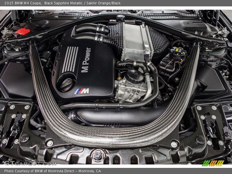Black Sapphire Metallic / Sakhir Orange/Black 2015 BMW M4 Coupe