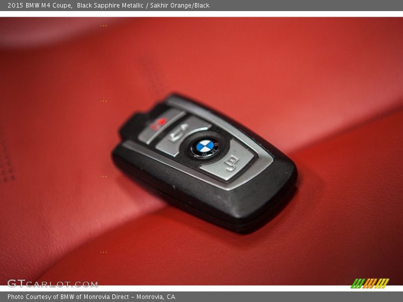 Black Sapphire Metallic / Sakhir Orange/Black 2015 BMW M4 Coupe