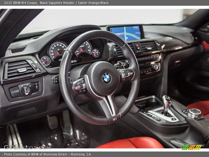 Black Sapphire Metallic / Sakhir Orange/Black 2015 BMW M4 Coupe