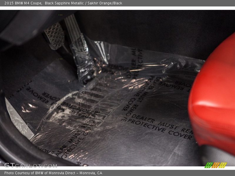 Black Sapphire Metallic / Sakhir Orange/Black 2015 BMW M4 Coupe