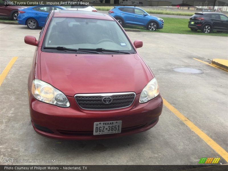 Impulse Red Pearl / Beige 2006 Toyota Corolla LE