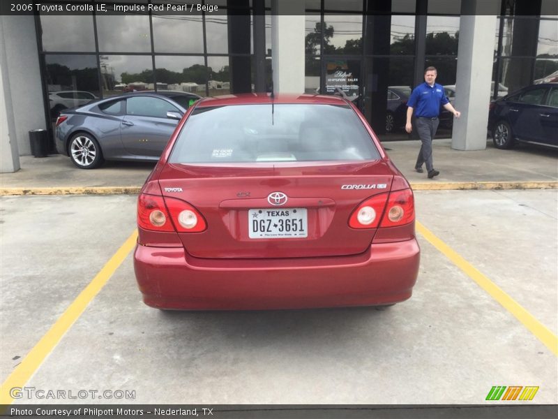 Impulse Red Pearl / Beige 2006 Toyota Corolla LE