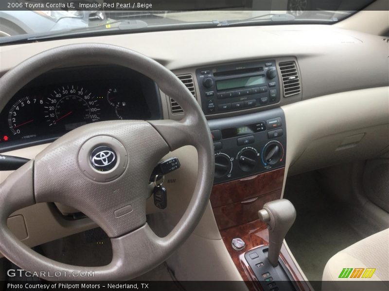 Impulse Red Pearl / Beige 2006 Toyota Corolla LE