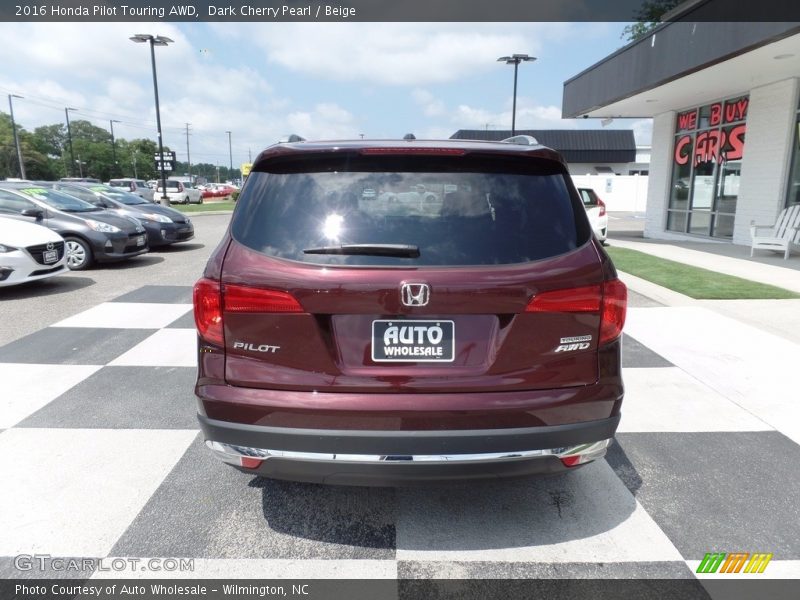 Dark Cherry Pearl / Beige 2016 Honda Pilot Touring AWD