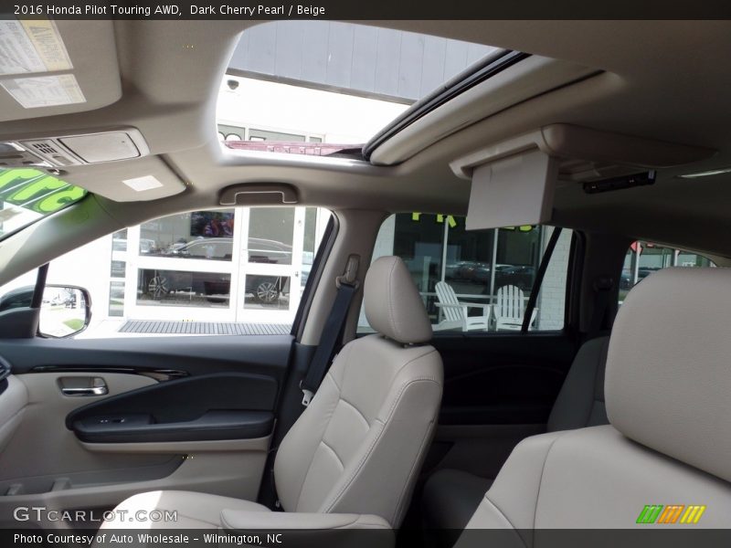 Dark Cherry Pearl / Beige 2016 Honda Pilot Touring AWD