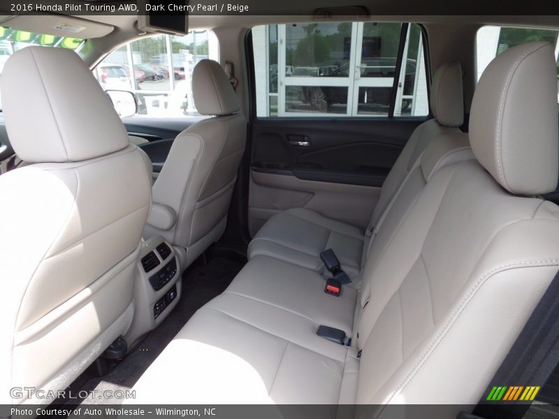 Dark Cherry Pearl / Beige 2016 Honda Pilot Touring AWD