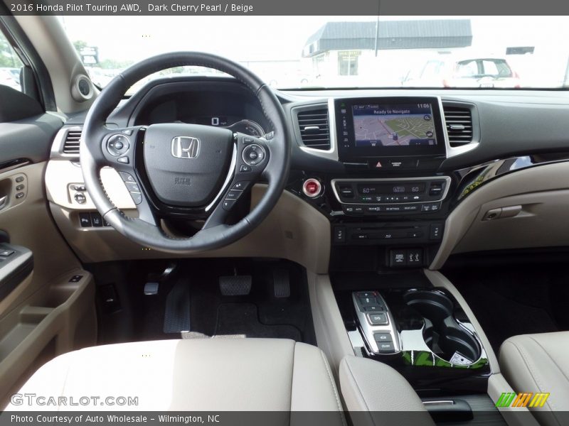 Dark Cherry Pearl / Beige 2016 Honda Pilot Touring AWD