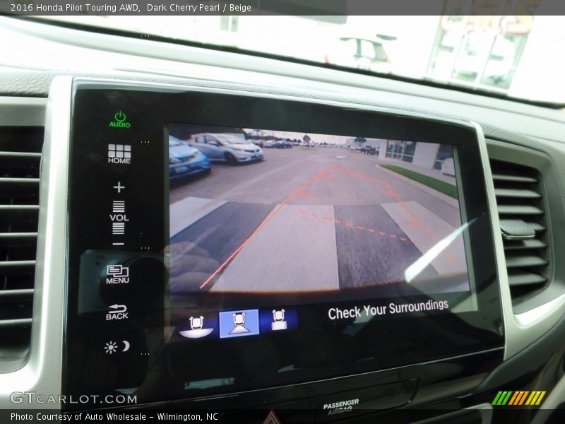Dark Cherry Pearl / Beige 2016 Honda Pilot Touring AWD