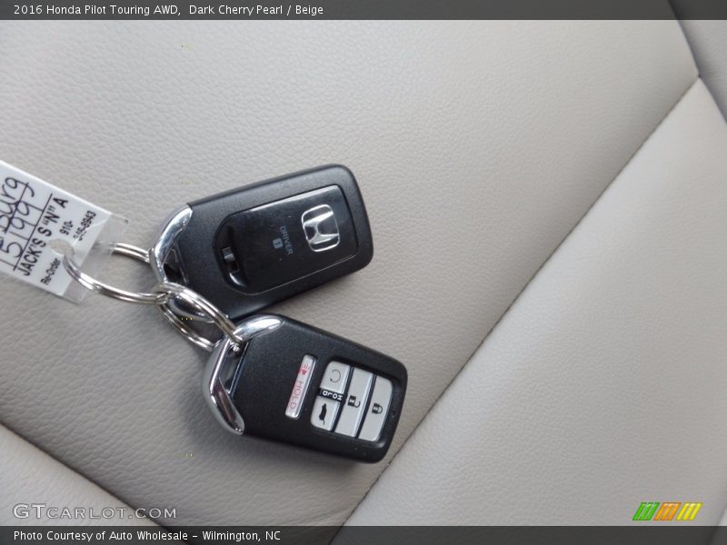 Dark Cherry Pearl / Beige 2016 Honda Pilot Touring AWD