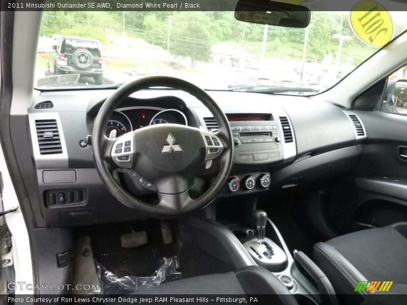 Diamond White Pearl / Black 2011 Mitsubishi Outlander SE AWD