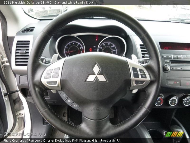 Diamond White Pearl / Black 2011 Mitsubishi Outlander SE AWD