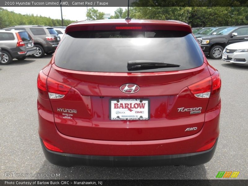 Garnet Red / Taupe 2010 Hyundai Tucson Limited AWD