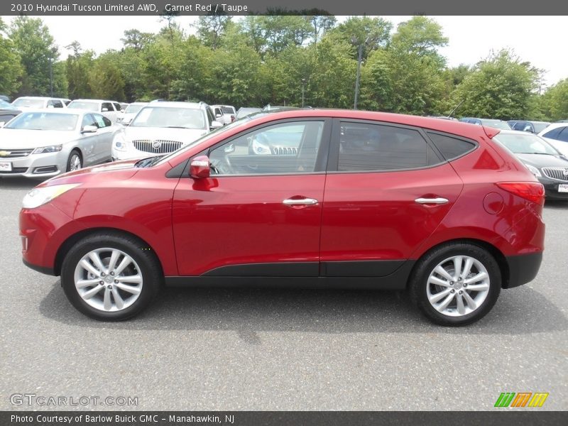 Garnet Red / Taupe 2010 Hyundai Tucson Limited AWD