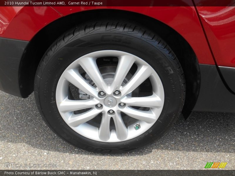 Garnet Red / Taupe 2010 Hyundai Tucson Limited AWD