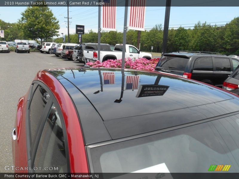 Garnet Red / Taupe 2010 Hyundai Tucson Limited AWD