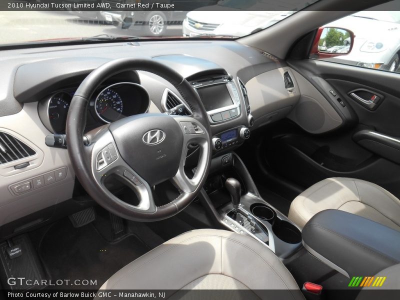 Garnet Red / Taupe 2010 Hyundai Tucson Limited AWD
