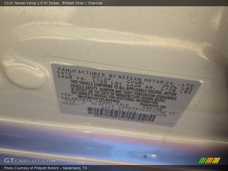 Brilliant Silver / Charcoal 2015 Nissan Versa 1.6 SV Sedan