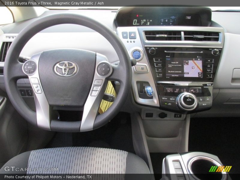 Dashboard of 2016 Prius v Three