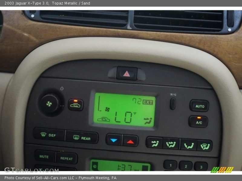 Topaz Metallic / Sand 2003 Jaguar X-Type 3.0