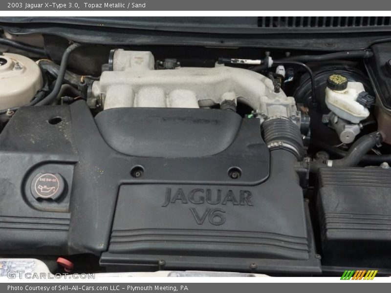 Topaz Metallic / Sand 2003 Jaguar X-Type 3.0