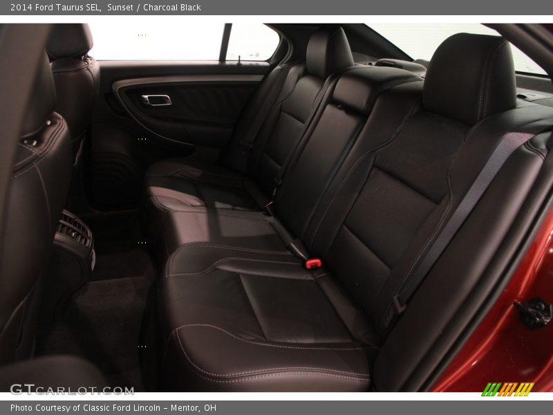 Sunset / Charcoal Black 2014 Ford Taurus SEL