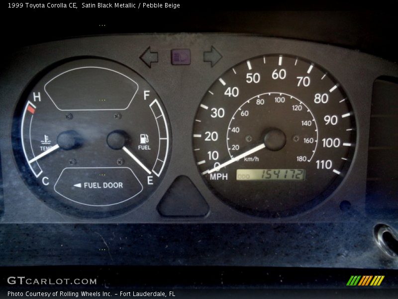 Satin Black Metallic / Pebble Beige 1999 Toyota Corolla CE