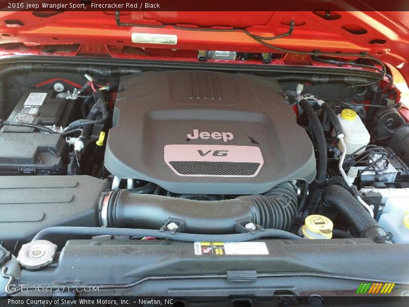Firecracker Red / Black 2016 Jeep Wrangler Sport