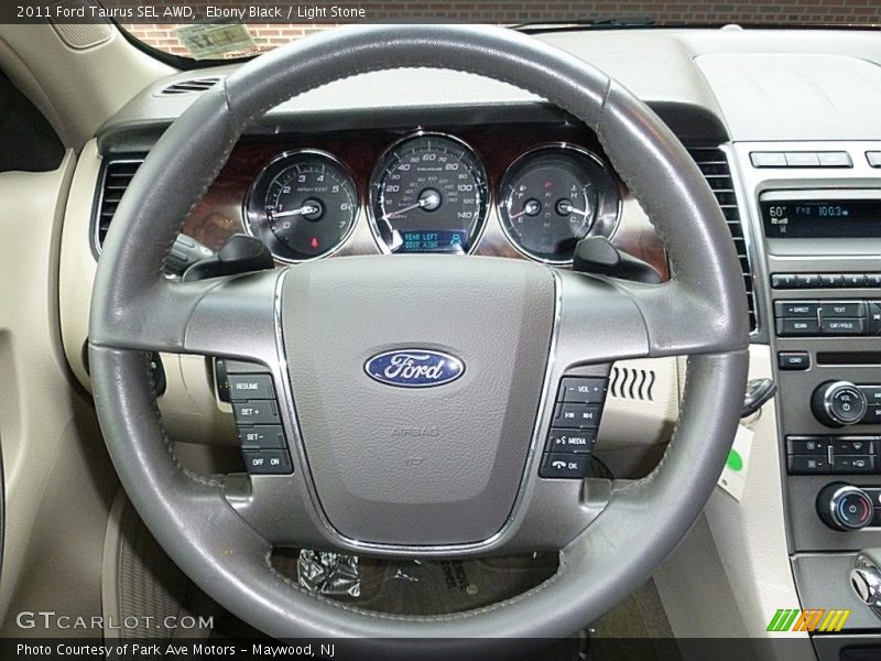 Ebony Black / Light Stone 2011 Ford Taurus SEL AWD