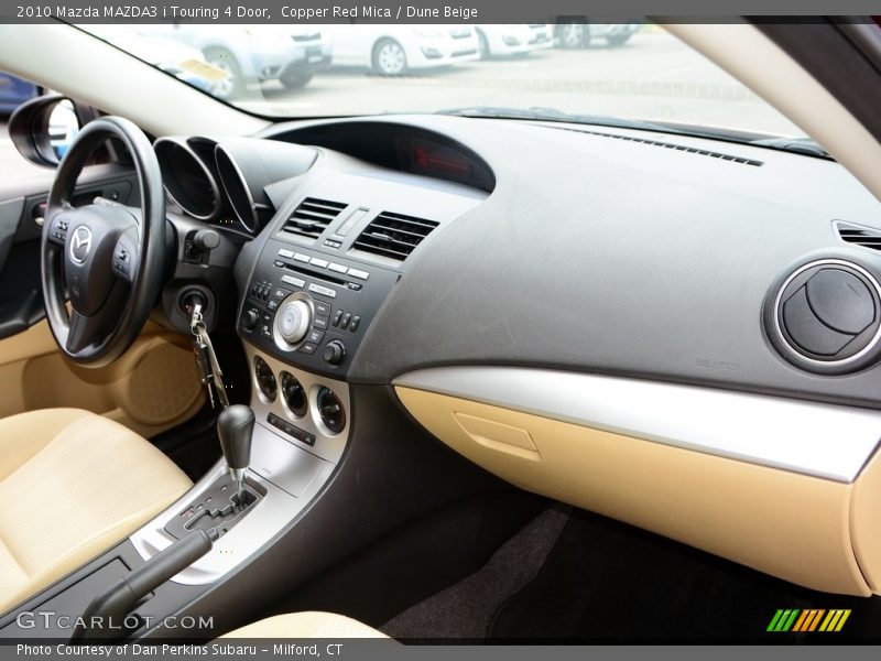Copper Red Mica / Dune Beige 2010 Mazda MAZDA3 i Touring 4 Door