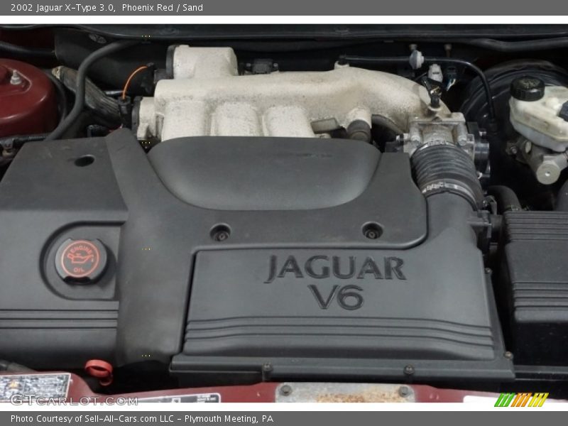 Phoenix Red / Sand 2002 Jaguar X-Type 3.0