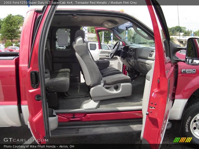 Toreador Red Metallic / Medium Flint Grey 2003 Ford F250 Super Duty XLT SuperCab 4x4