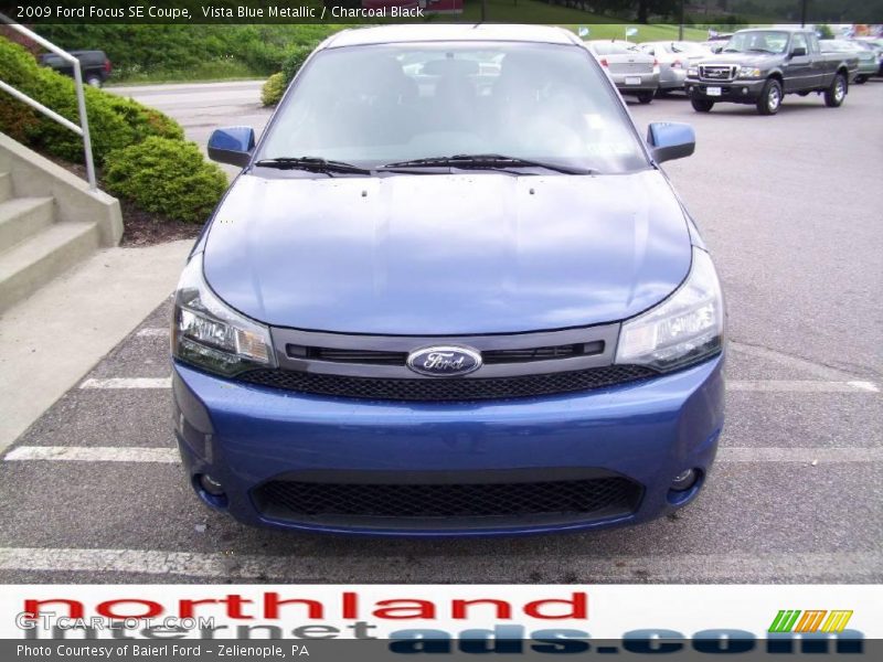 Vista Blue Metallic / Charcoal Black 2009 Ford Focus SE Coupe