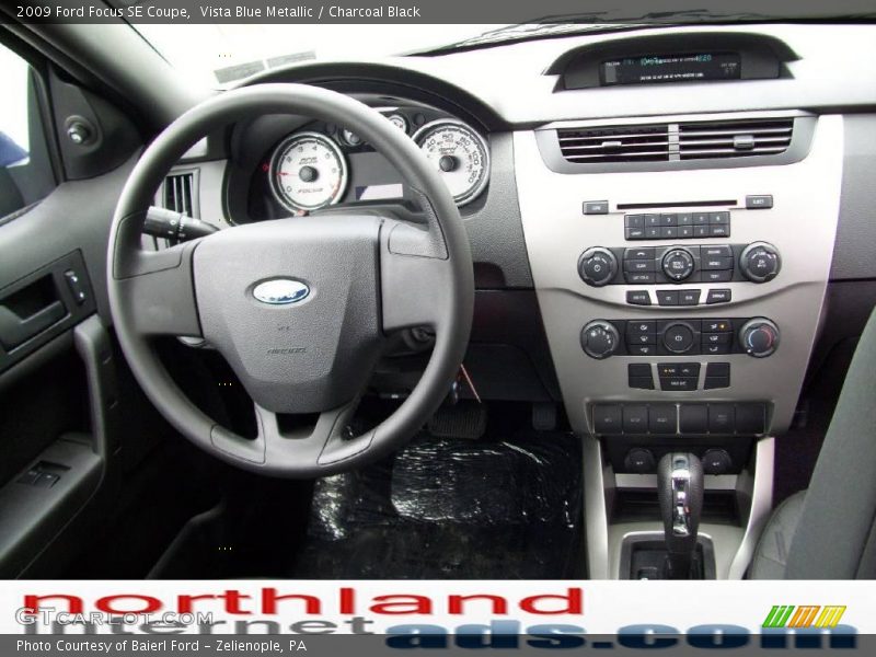 Vista Blue Metallic / Charcoal Black 2009 Ford Focus SE Coupe