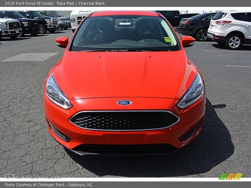 Race Red / Charcoal Black 2016 Ford Focus SE Sedan