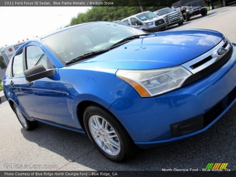 Blue Flame Metallic / Medium Stone 2011 Ford Focus SE Sedan