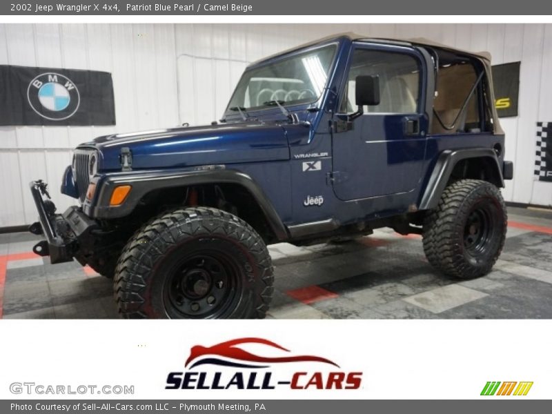 Patriot Blue Pearl / Camel Beige 2002 Jeep Wrangler X 4x4