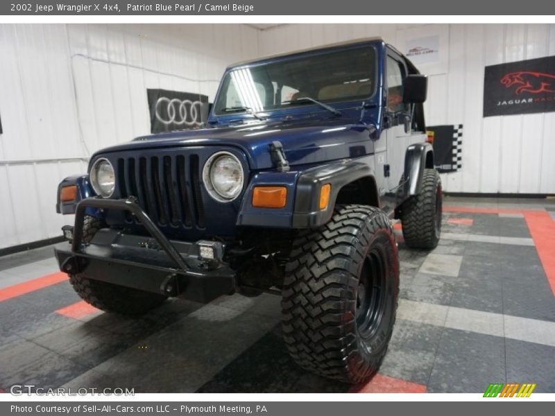Patriot Blue Pearl / Camel Beige 2002 Jeep Wrangler X 4x4