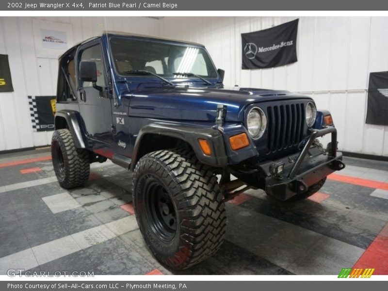 Patriot Blue Pearl / Camel Beige 2002 Jeep Wrangler X 4x4