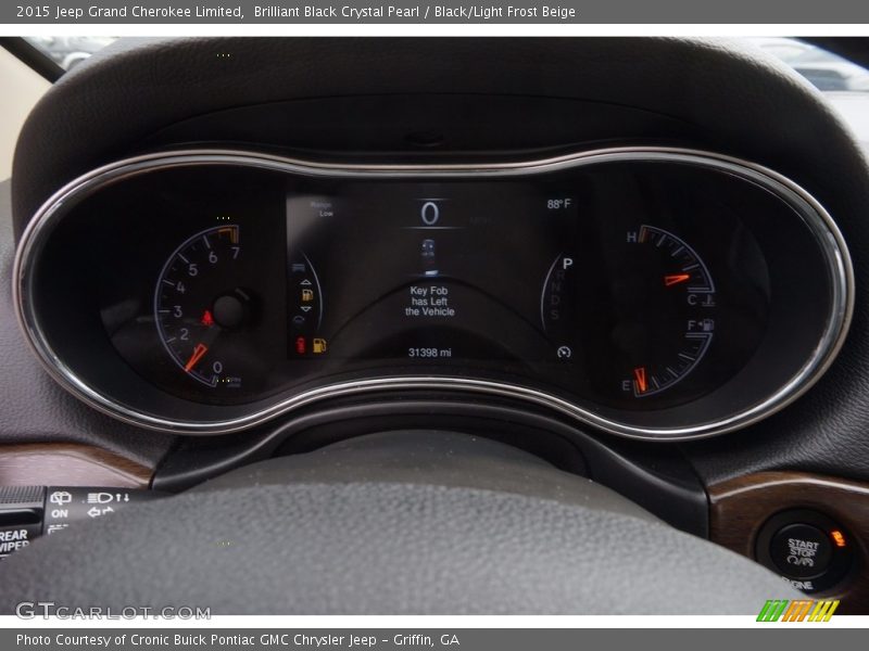 Brilliant Black Crystal Pearl / Black/Light Frost Beige 2015 Jeep Grand Cherokee Limited