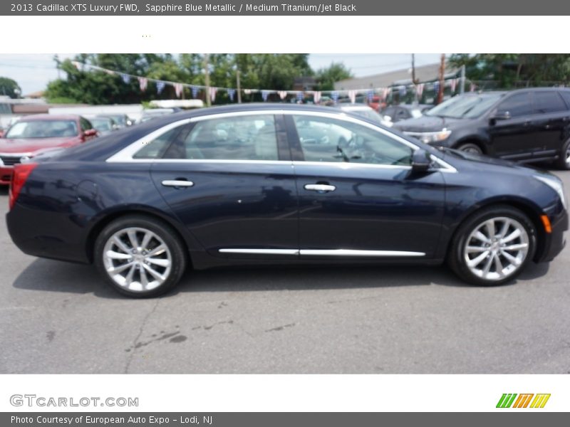 Sapphire Blue Metallic / Medium Titanium/Jet Black 2013 Cadillac XTS Luxury FWD