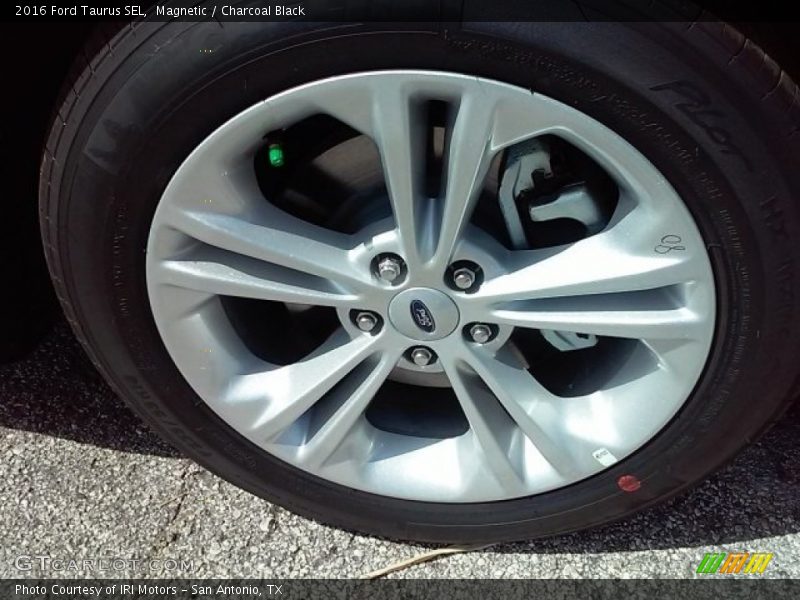 Magnetic / Charcoal Black 2016 Ford Taurus SEL