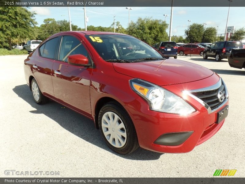 Red Brick / Charcoal 2015 Nissan Versa 1.6 SV Sedan