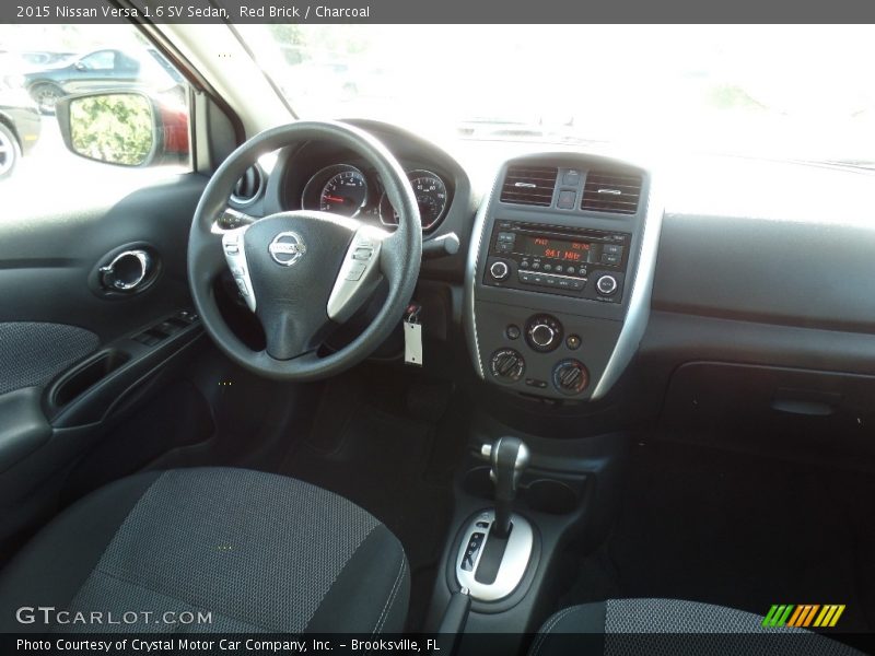 Red Brick / Charcoal 2015 Nissan Versa 1.6 SV Sedan