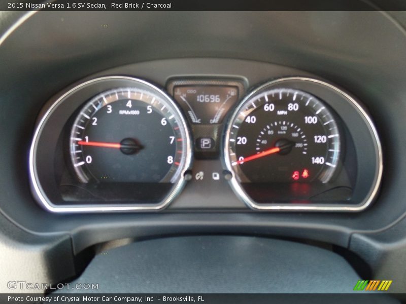 Red Brick / Charcoal 2015 Nissan Versa 1.6 SV Sedan
