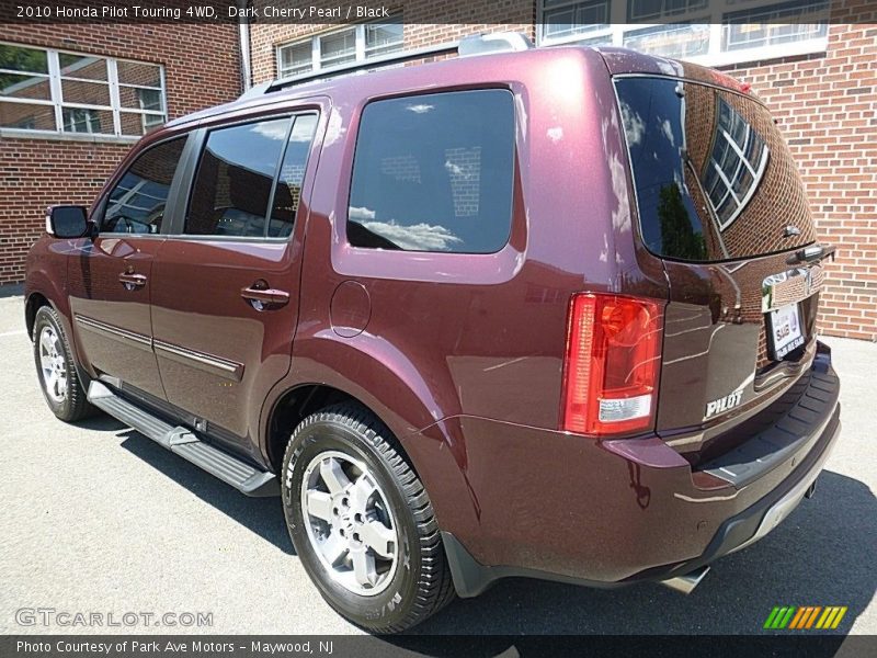 Dark Cherry Pearl / Black 2010 Honda Pilot Touring 4WD