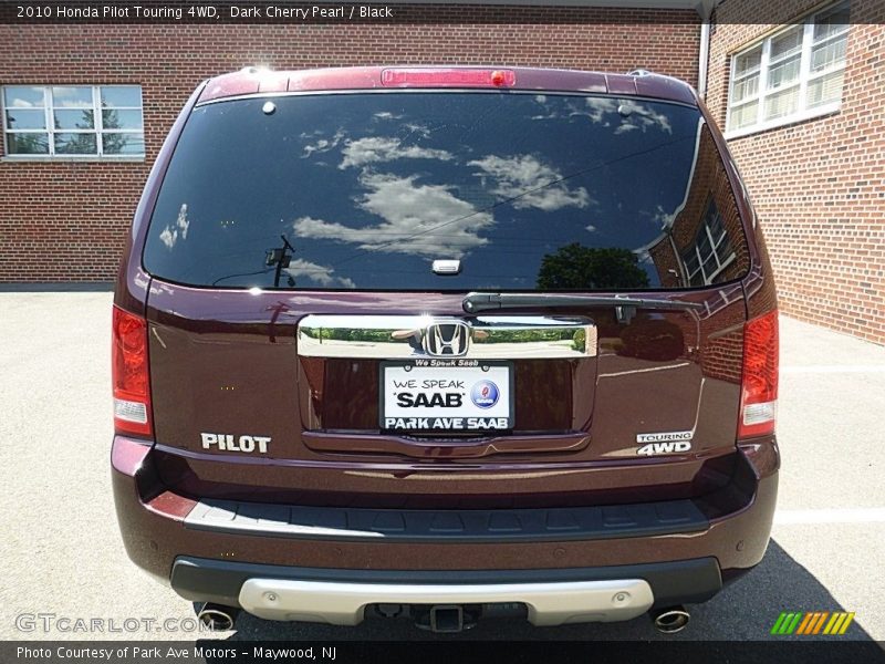 Dark Cherry Pearl / Black 2010 Honda Pilot Touring 4WD