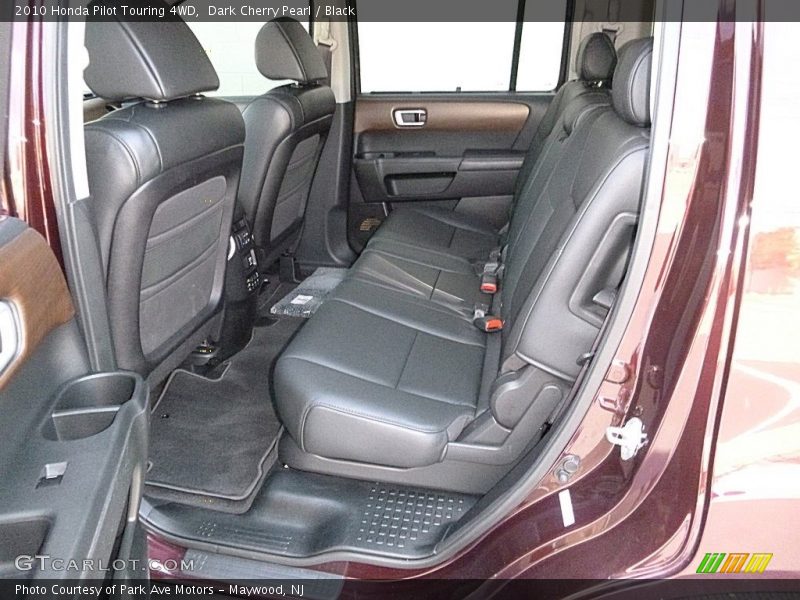 Dark Cherry Pearl / Black 2010 Honda Pilot Touring 4WD